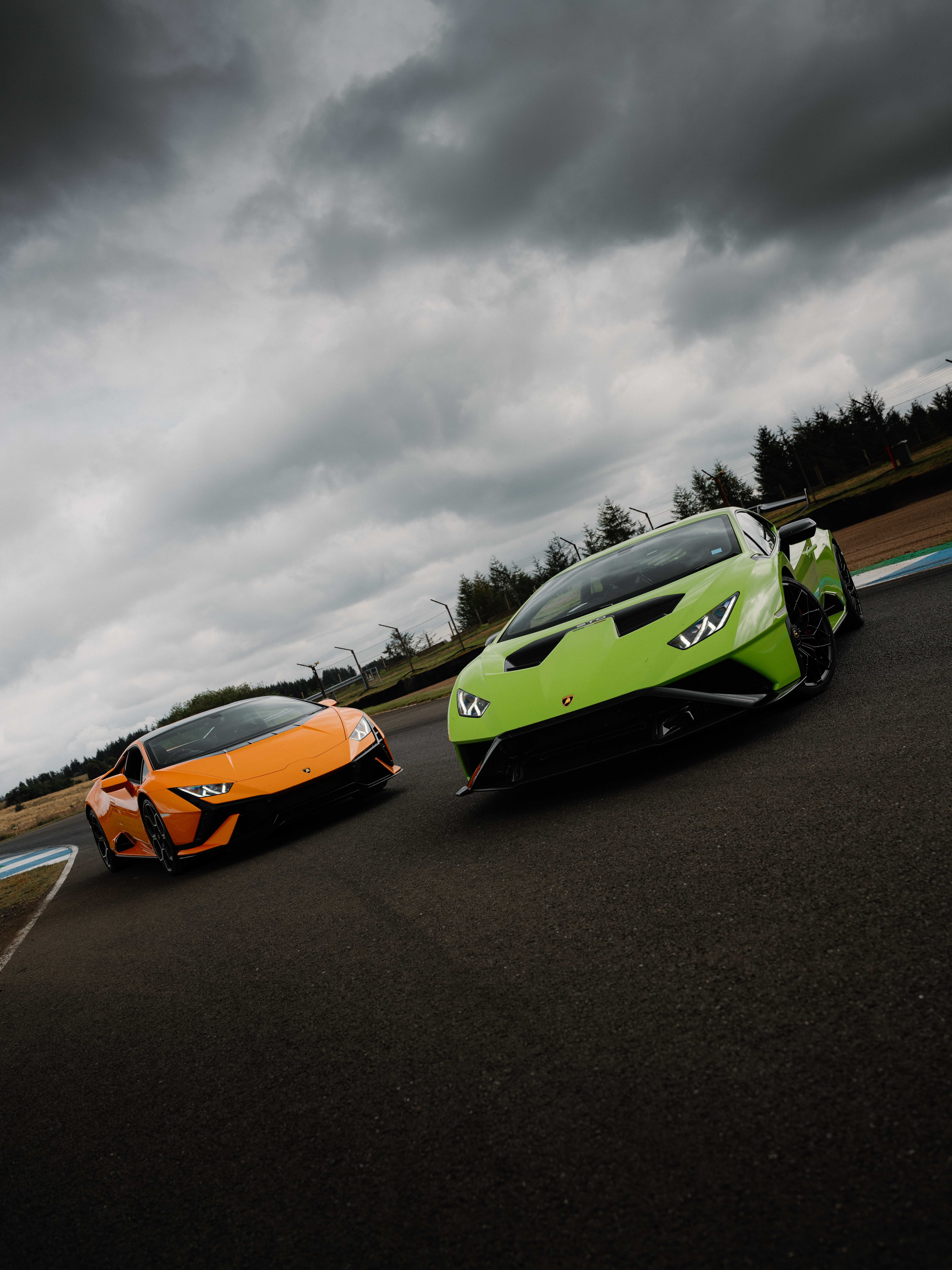 A green and an orange Lambourghini